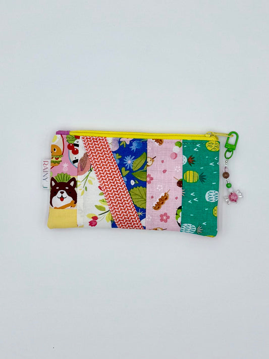 kawaii cosmetic pouch with food and dog prints with a kawaii charm