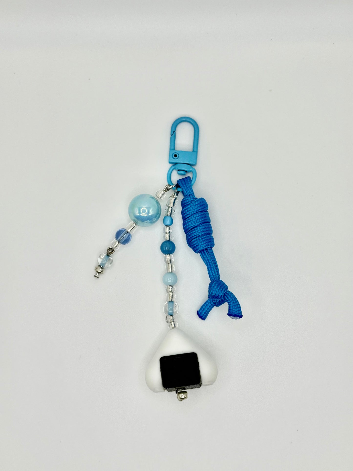 Handmade onigiri rice ball charm with seaweed wrap detail, front view