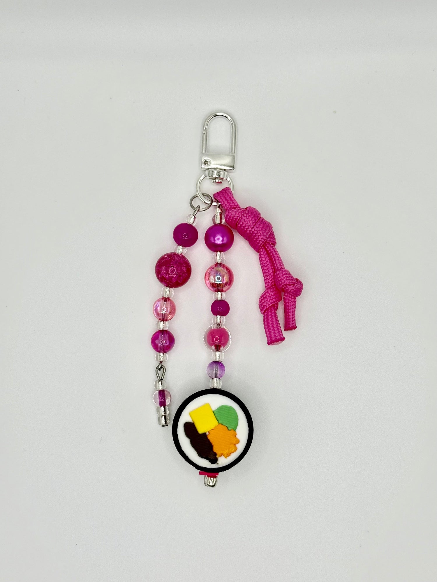 Handmade kimbap charm with rice and seaweed design, front view