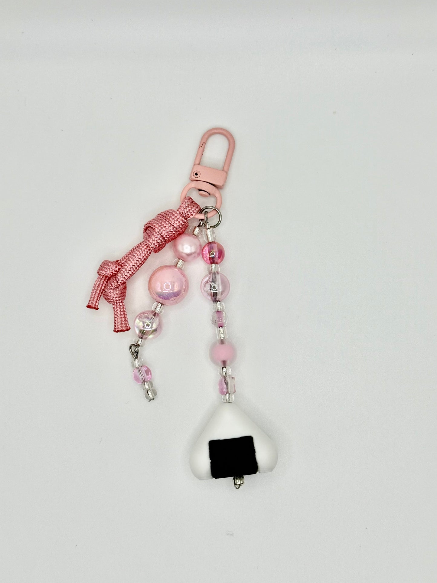 Handmade onigiri rice ball charm with seaweed wrap detail, front view.