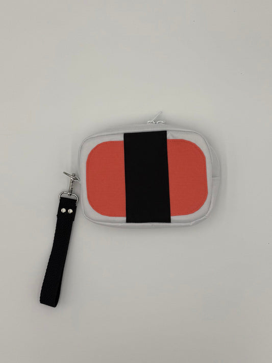 spam musubi shaped zippered bag with black wrist strap